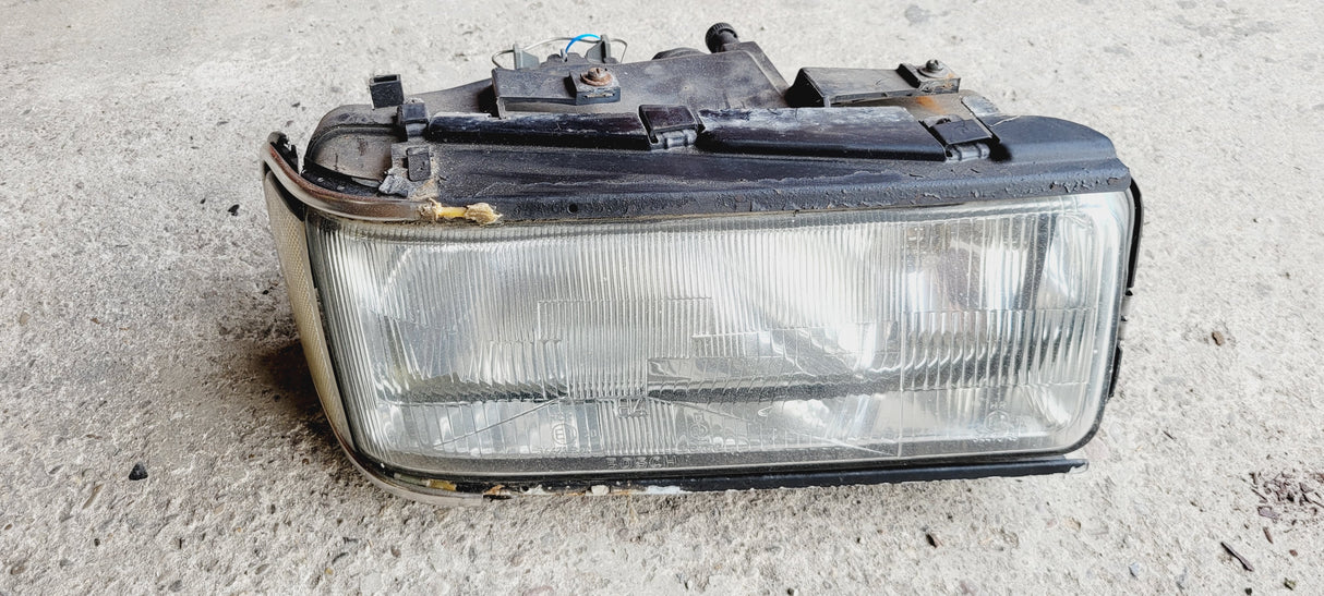 Gebrauchter Frontscheinwerfer (Beifahrerseite) für Audi 200 20V mit Seitenreflektor